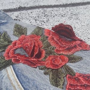 Distressed  jean - jacket with embroidered roses